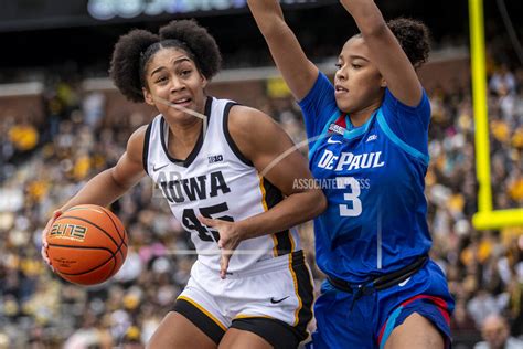 Clark’s triple-double highlights game at Kinnick. Women’s basketball record crowd of 55,646 shows up